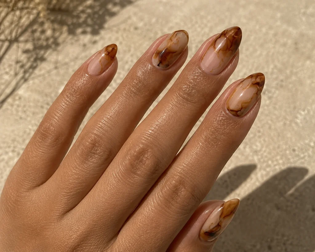 17 September Nail Ideas for a Stylish Start to Fall Caramel and espresso swirl nails for fall