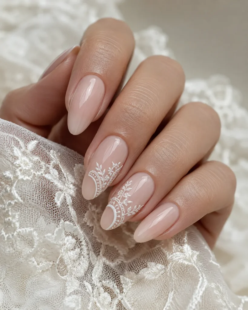 17+ Wedding Nails That Feel Elegant, Personal and Picture-Perfect Bridal nails with delicate white lace linework