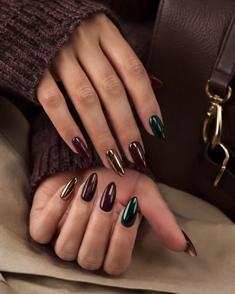 25 Fall Nail Design Ideas to Try in Fall 2026 Long almond fall nail design with chrome and autumn colors
