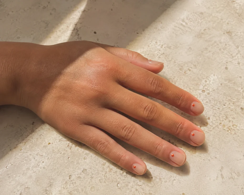 19+ Burnt Orange Nail Designs for a Rich, Modern Manicure Simple burnt orange nail designs with tiny dot accents
