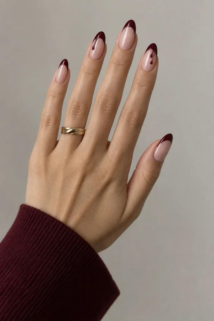 9+ Best Halloween French Tip Nails for a Chic October Manicure Halloween French tip nails with elegant oxblood drip details.