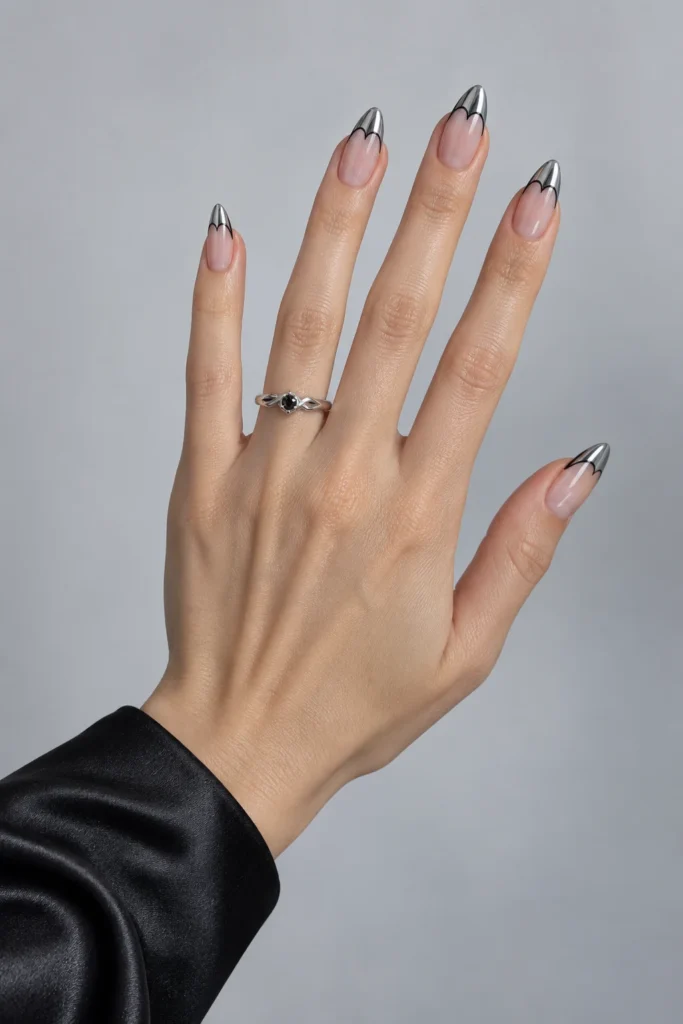 9+ Best Halloween French Tip Nails for a Chic October Manicure Halloween French tip nails with silver chrome bat-wing tips.