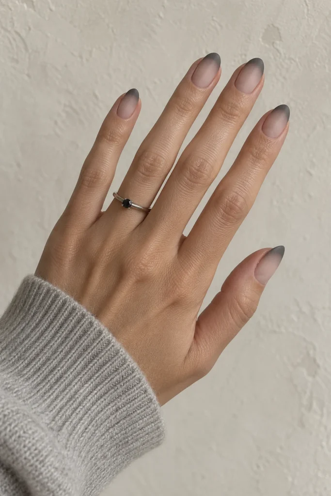 Short nails with smoky charcoal French tips for Halloween