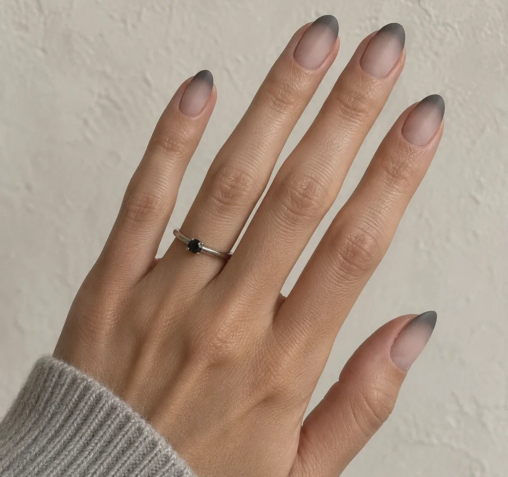 Short nails with smoky charcoal French tips for Halloween